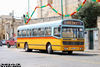 Blue-topped AEC Swift FBY665 stands at Zejtun, awaiting passengers transferring from a  bus  from Marsaxlokk before commencing its run into Valetta.  Despite some side and frontal embellishments it still has its engine at the back and is largely unaltered from its days as LT SMS810